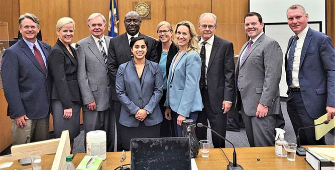 Greg Yates and colleagues at court