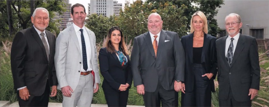 Attorney Gregory Yates with legal colleagues